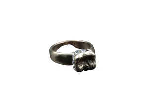 Anillo adulto en forma de muela
